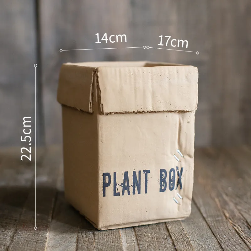 Cement flowerpot with perforated base and Nordic brown paper box design