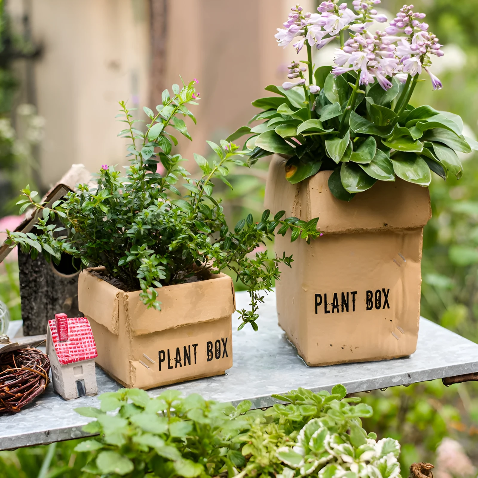 Cement flowerpot with perforated base and Nordic brown paper box design