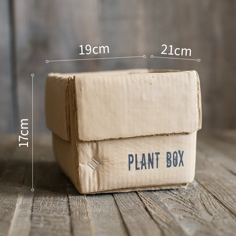 Cement flowerpot with perforated base and Nordic brown paper box design