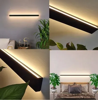 Black minimalist bedside wall lamp in 40cm to 200cm lengths with three light colour options on a wall