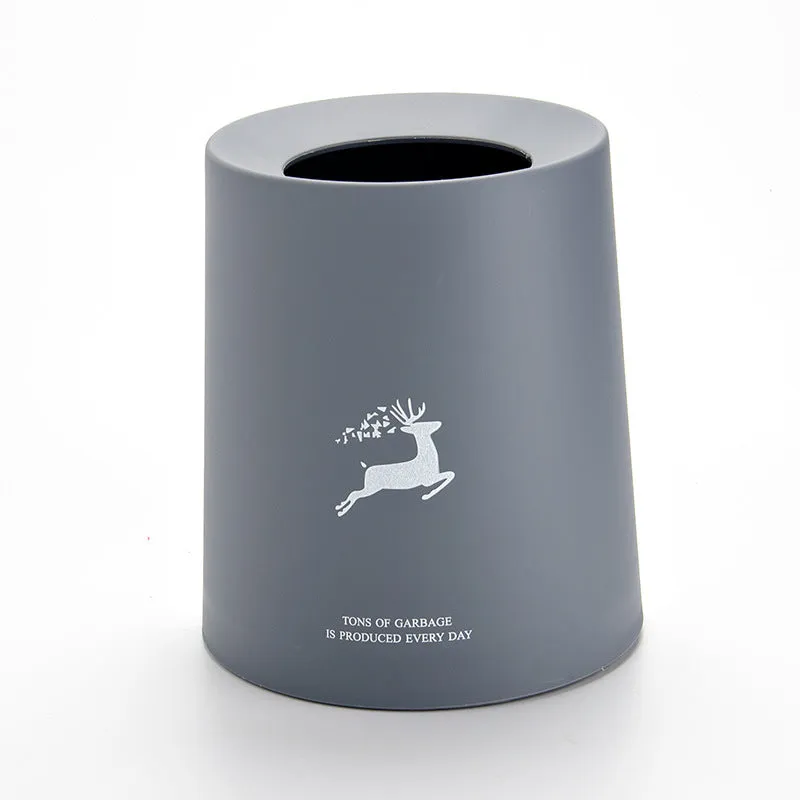 Creative Nordic plastic trash can with decorative pattern in a home setting