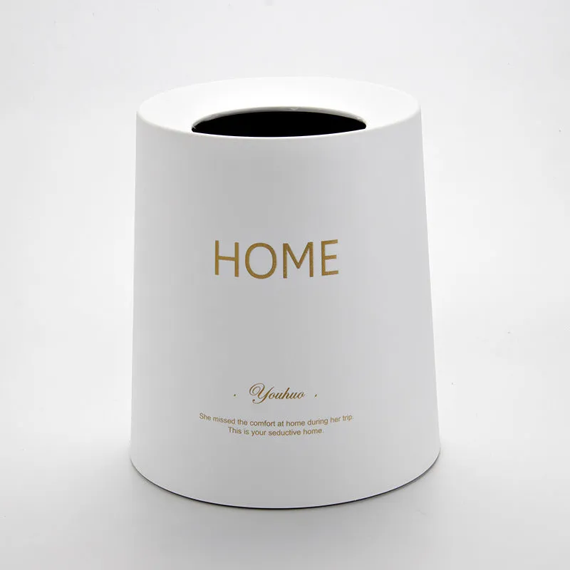 Creative Nordic plastic trash can with decorative pattern in a home setting