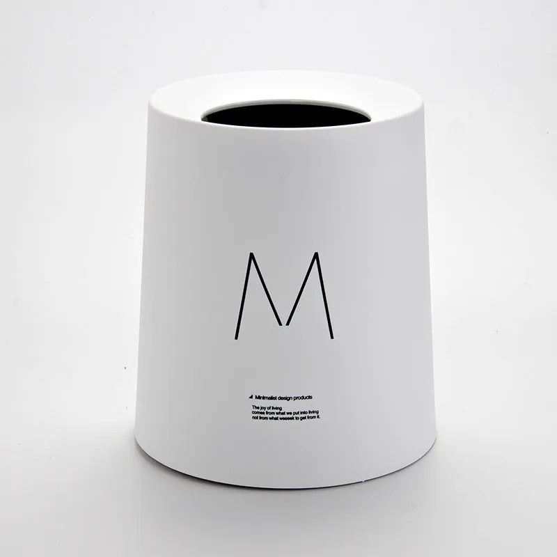Creative Nordic plastic trash can with decorative pattern in a home setting