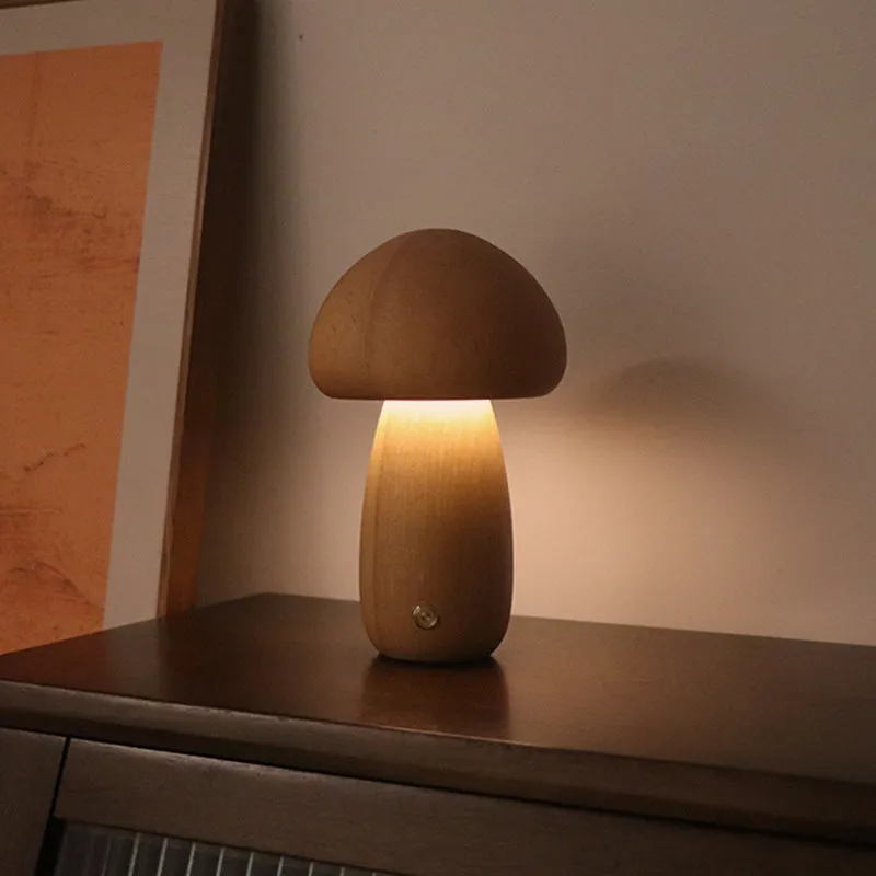 Wooden mushroom-shaped LED night light with touch switch on a bedside table, beech finish, 165 x 100 mm