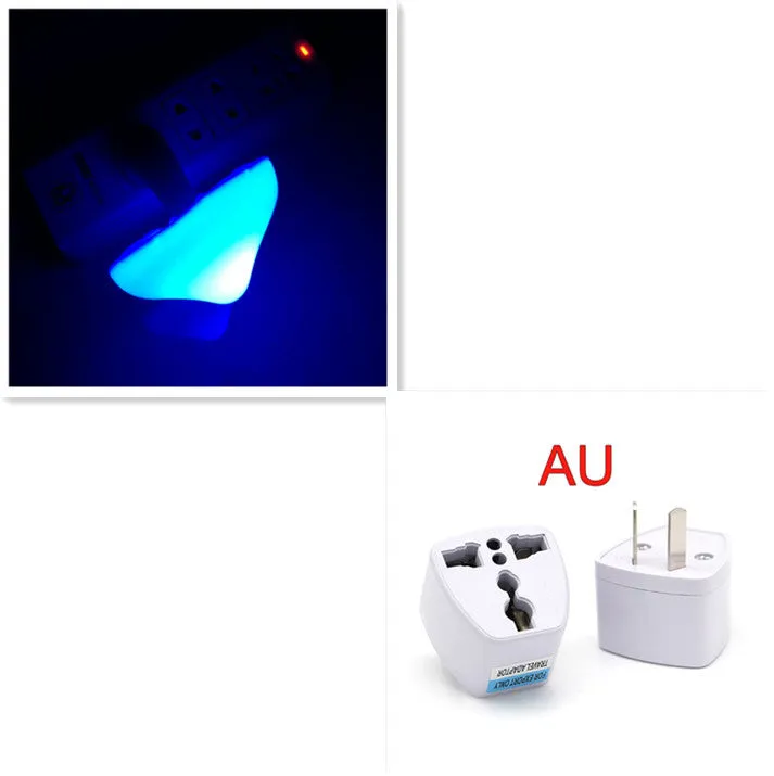 Mushroom-shaped LED night light with light sensor, warm yellow glow, plugging into a wall socket