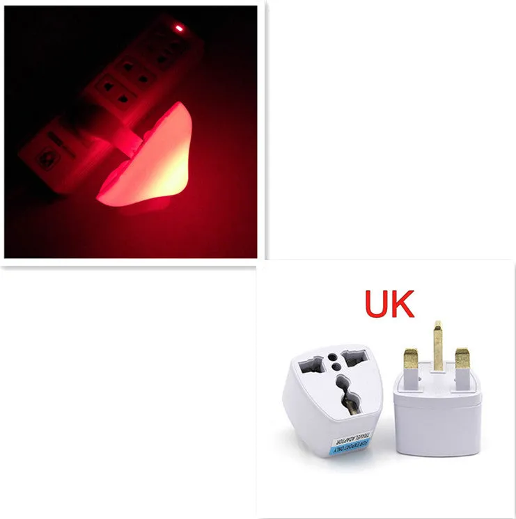 Mushroom-shaped LED night light with light sensor, warm yellow glow, plugging into a wall socket