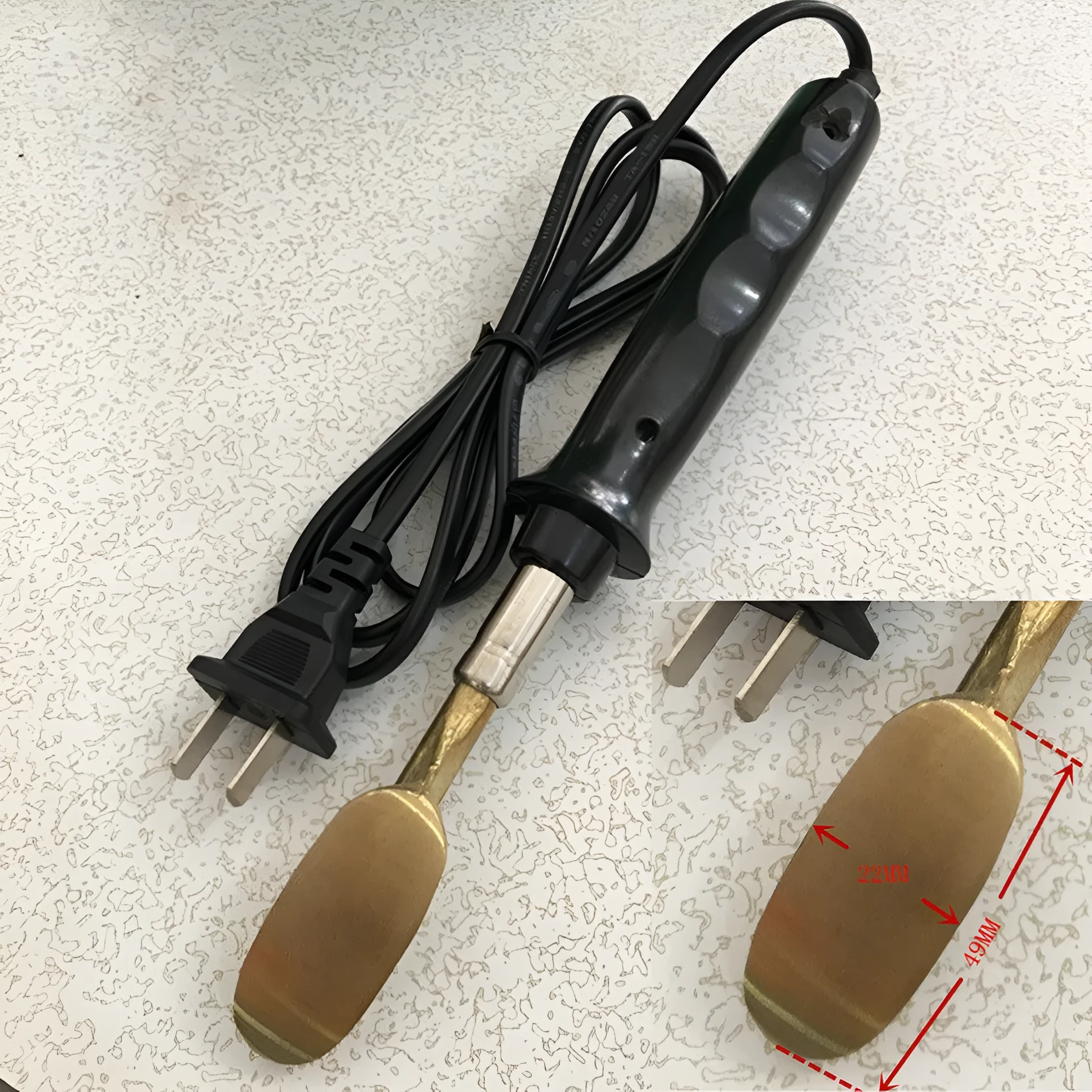Black ABS wrinkle grinding and heating tool on a workbench