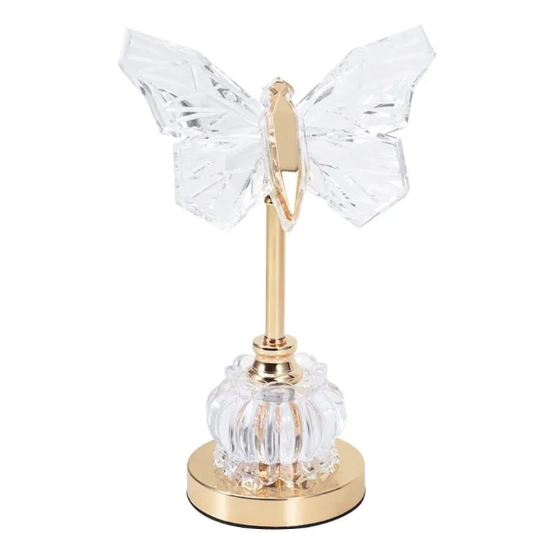 Butterfly table lamp with adjustable brightness and angle in a bedroom setting with USB plug-in