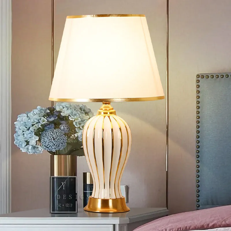 Ceramic table lamp in simple modern style with green diamond pattern and gold edge, bedside lighting use