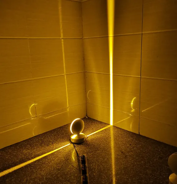 Modern aluminium and glass wall spotlight bar with multi-colour LED lighting