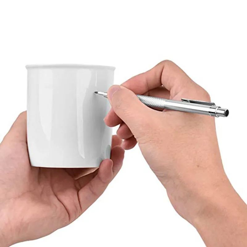 Silver aluminium glass marking pen with tungsten carbide tip on a white background