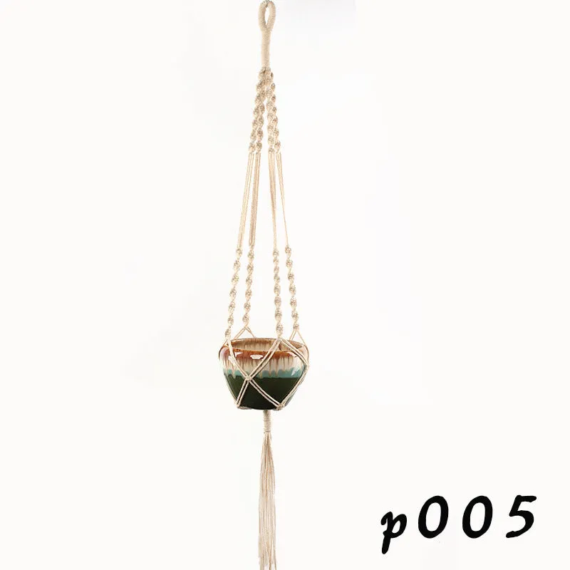 A rustic-style woven cotton rope plant trellis panel supporting green leaves.