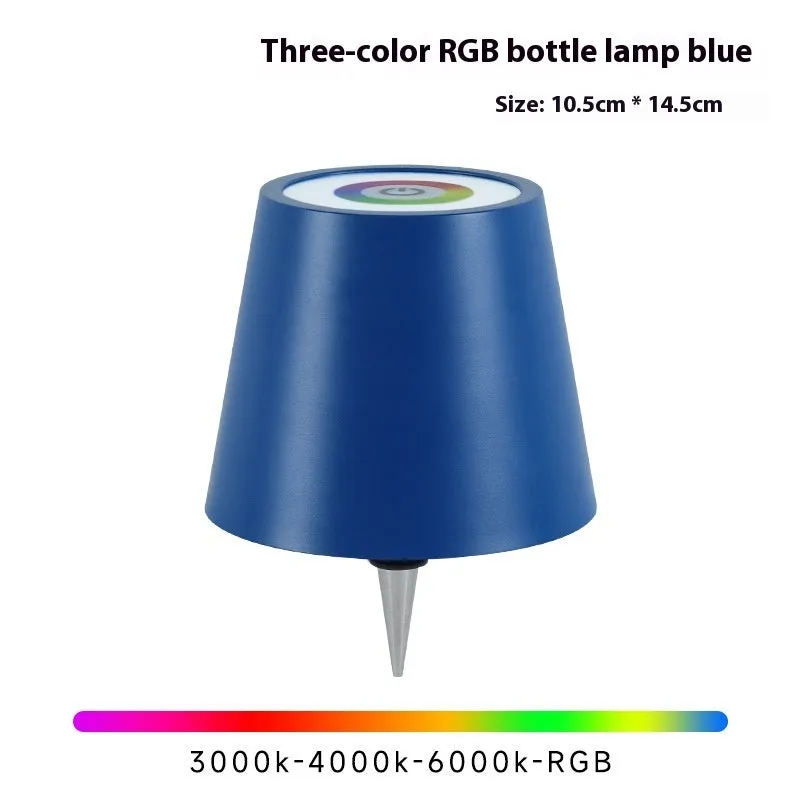 Plug-in wine bottle lamp with RGB tricolour dimming in wrought iron black finish on a table
