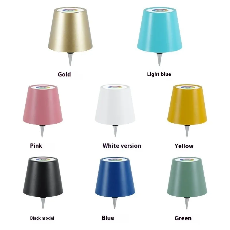 Plug-in wine bottle lamp with RGB tricolour dimming in wrought iron black finish on a table