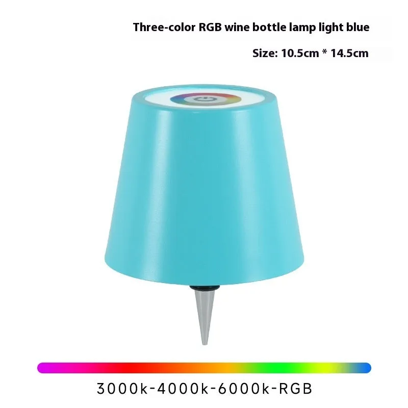 Plug-in wine bottle lamp with RGB tricolour dimming in wrought iron black finish on a table