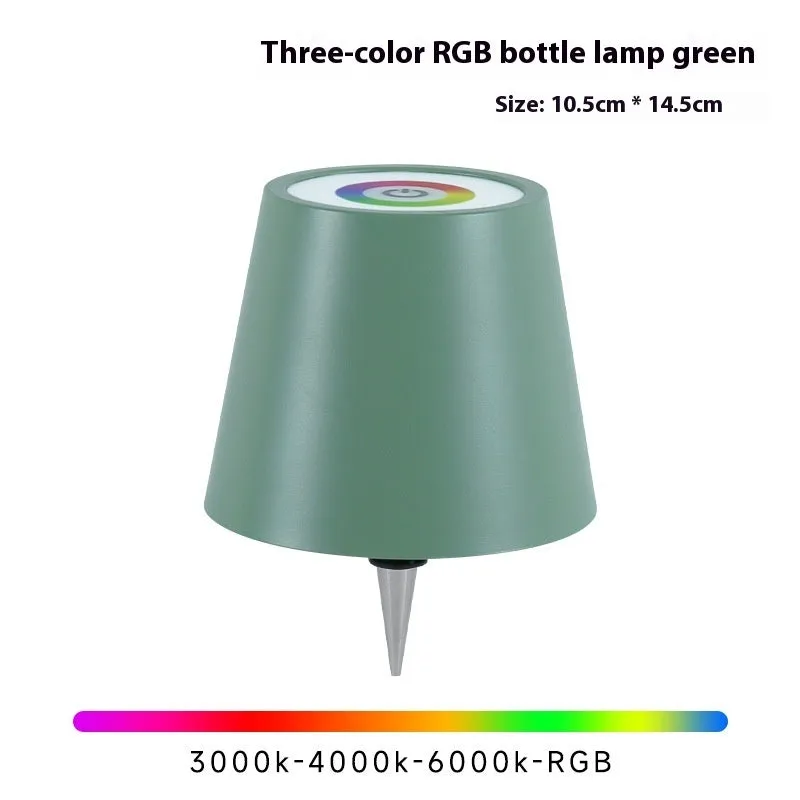 Plug-in wine bottle lamp with RGB tricolour dimming in wrought iron black finish on a table