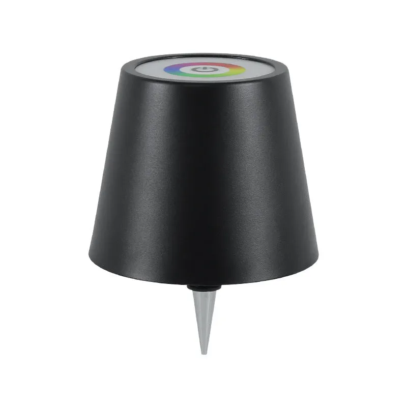 Plug-in wine bottle lamp with RGB tricolour dimming in wrought iron black finish on a table