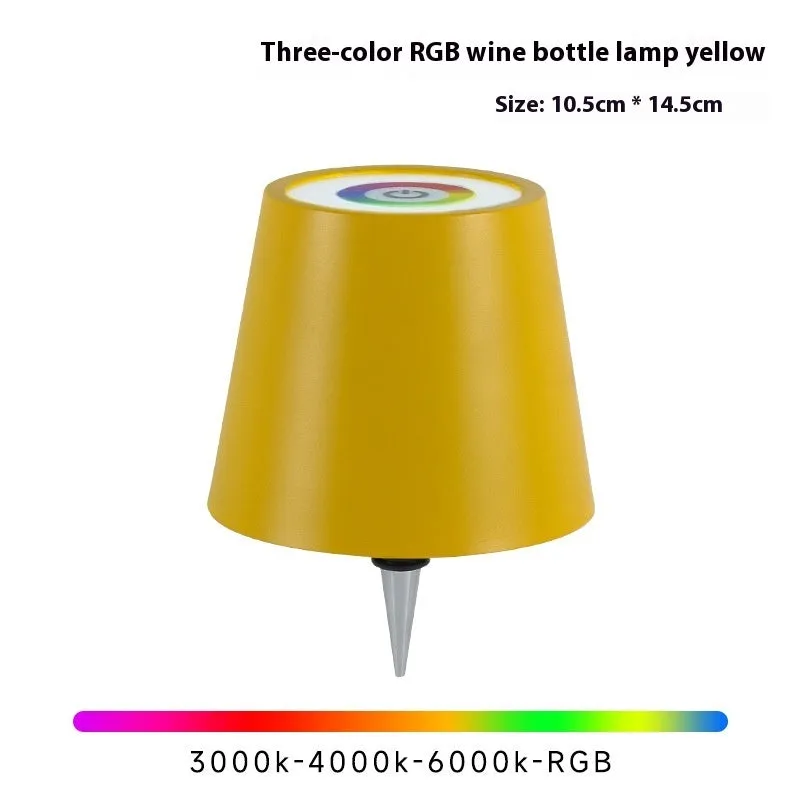Plug-in wine bottle lamp with RGB tricolour dimming in wrought iron black finish on a table