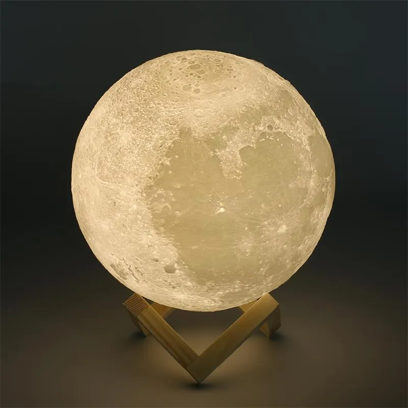 3D printed moon lamp on wooden stand showing lunar surface details with touch control ring