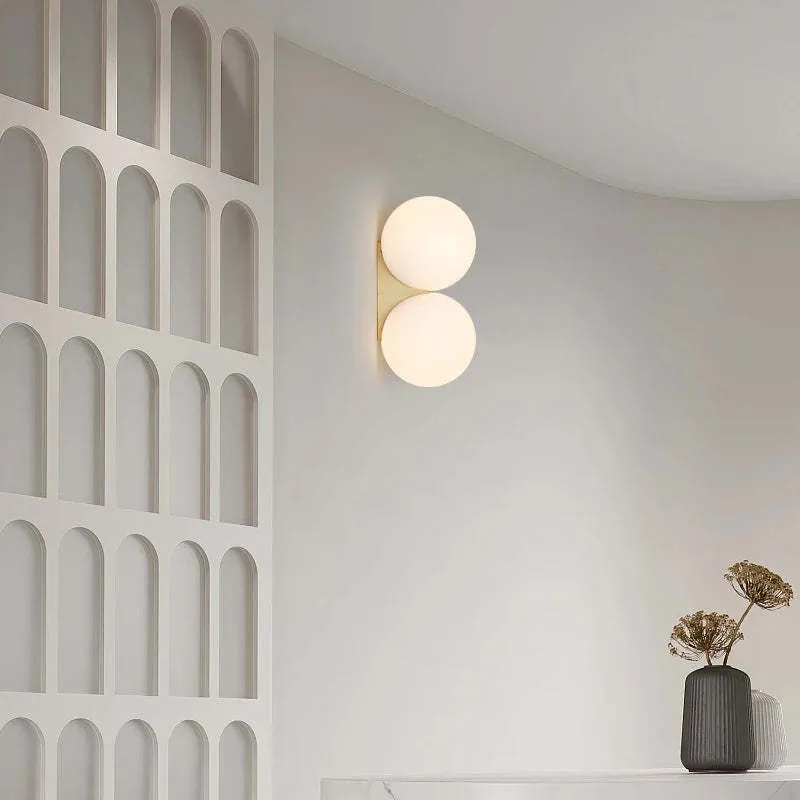 Double-headed Nordic glass ball wall lamp with gold iron finish for bedroom bedside lighting