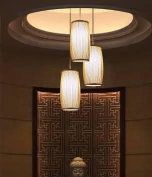 Bamboo hanging lamp with woven rattan shade and E27 fitting for staircase lighting