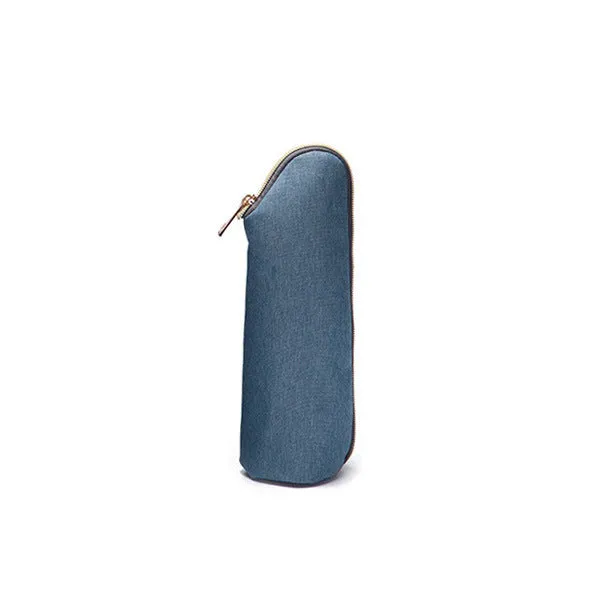 FAMICARE insulated milk bottle bag in small handbag style with polyester outer and thermal lining in black