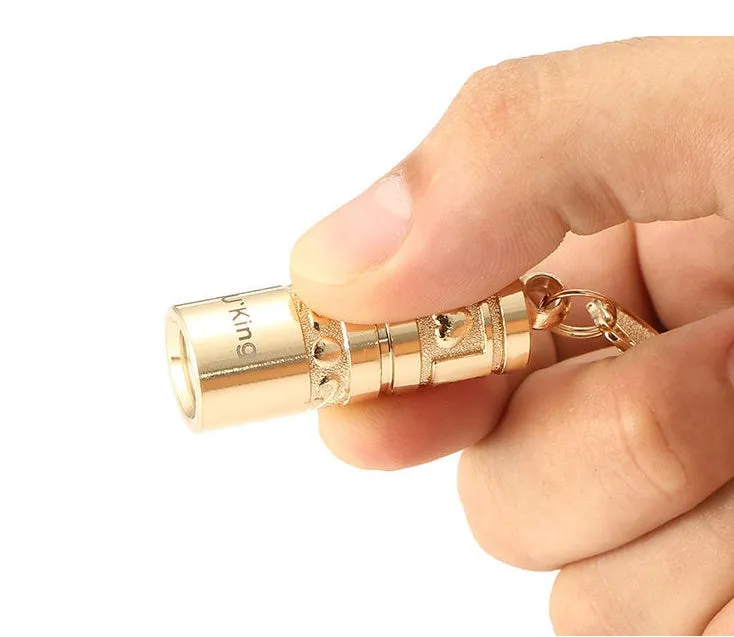 Gold zinc alloy waterproof LED keychain torch for outdoor emergency use