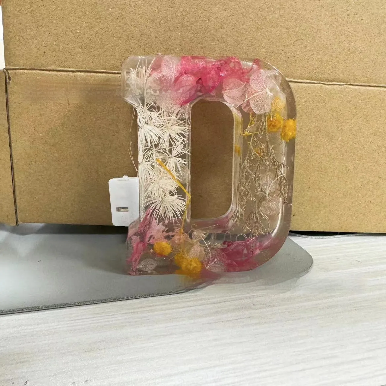 Transparent resin night light ornament with letter flower design, 15cm square, multiple colour options