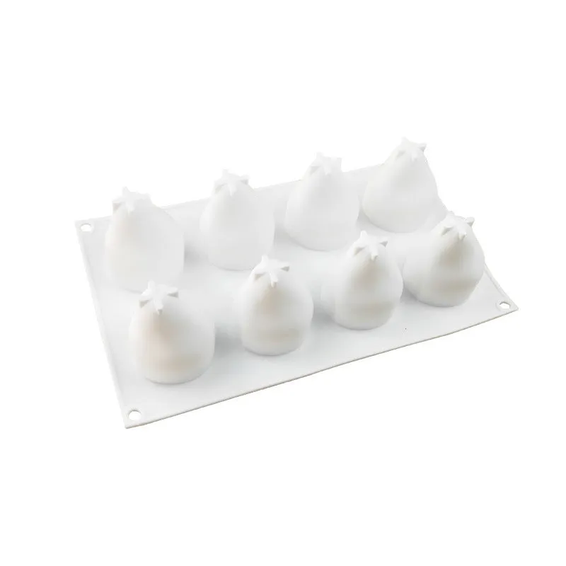 Six-cavity silicone baking mould with detailed pineapple, pine cone, and pear shapes for making Italian mousse.