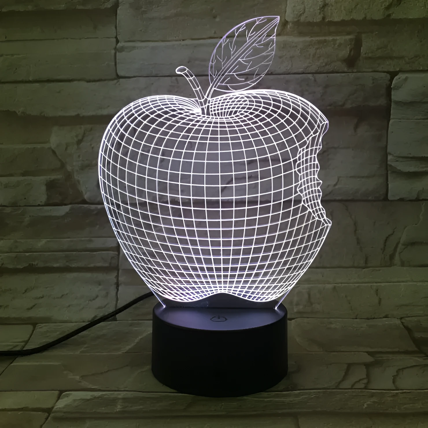 A colourful 3D fruit-shaped LED night light with a touch control panel.