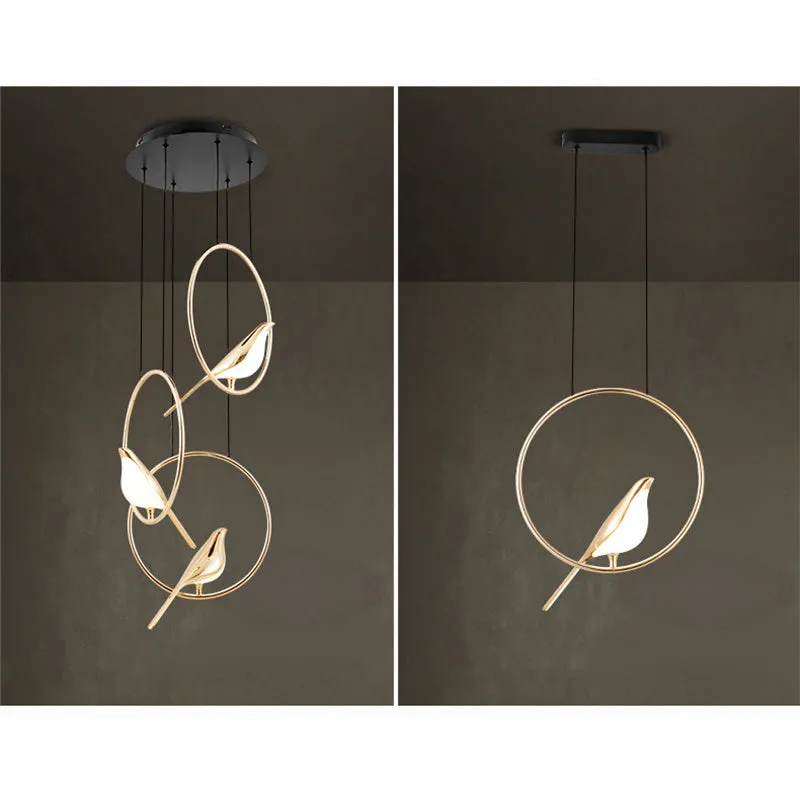 Tall modern magpie bird chandelier in zinc alloy and acrylic with neutral white LED light.