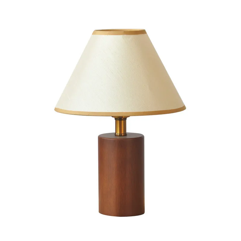 Brown cylindrical wooden bedside lamp with beige cover and E14 bulb base