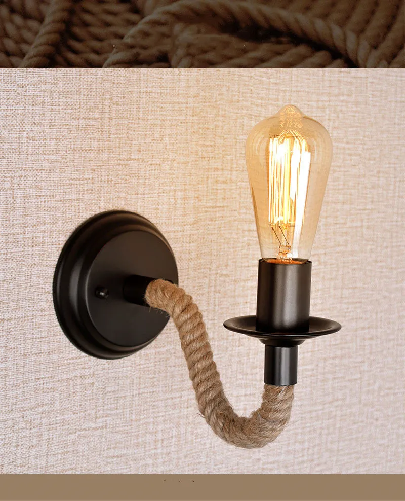Retro creative wrought iron twine wall lamp in black with handmade hemp rope wrap on a bedside table