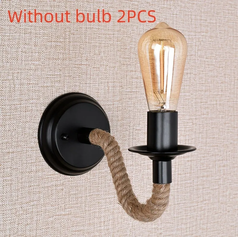 Retro creative wrought iron twine wall lamp in black with handmade hemp rope wrap on a bedside table