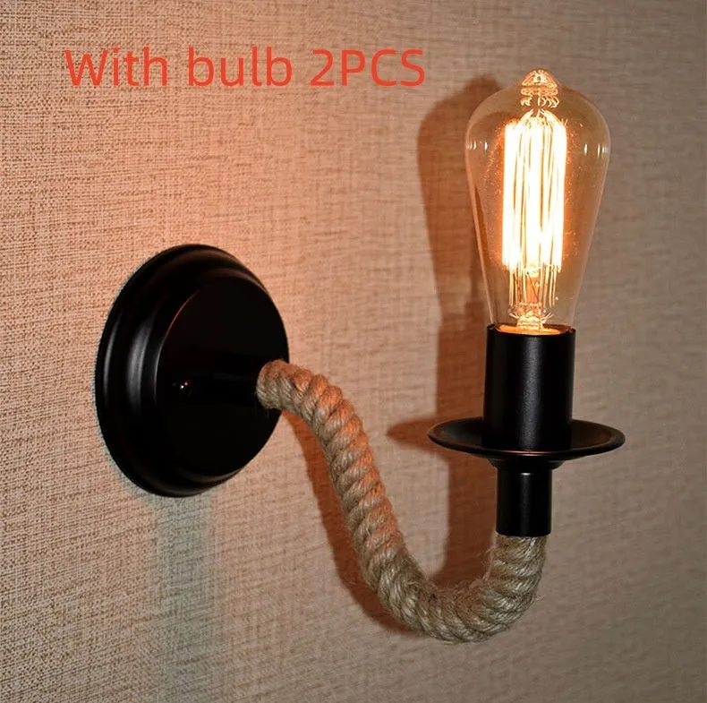 Retro creative wrought iron twine wall lamp in black with handmade hemp rope wrap on a bedside table
