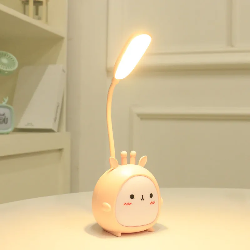 Cartoon deer USB charging folding LED reading lamp with plastic shade on desk