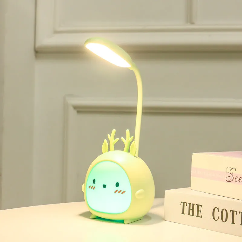 Cartoon deer USB charging folding LED reading lamp with plastic shade on desk