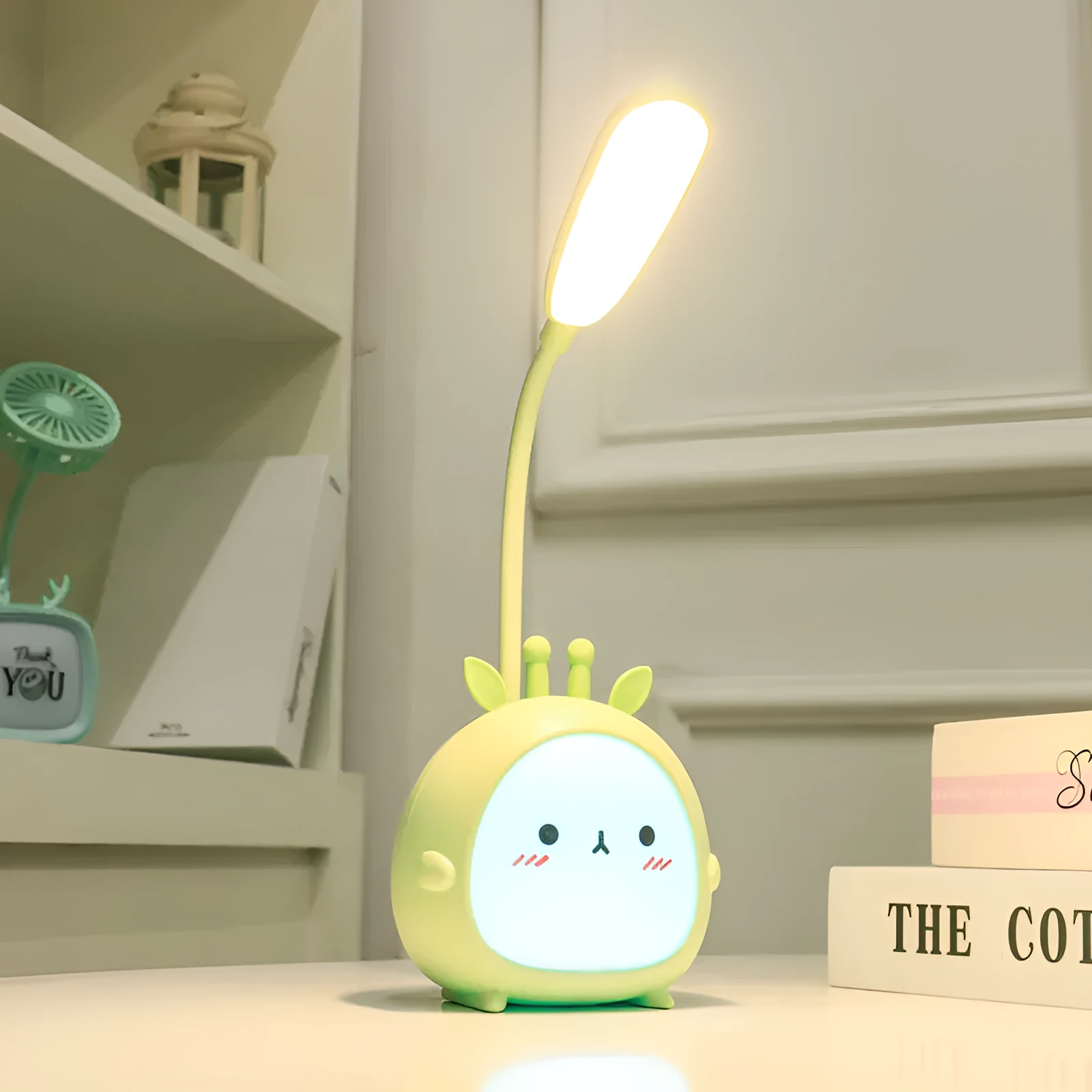 Cartoon deer USB charging folding LED reading lamp with plastic shade on desk