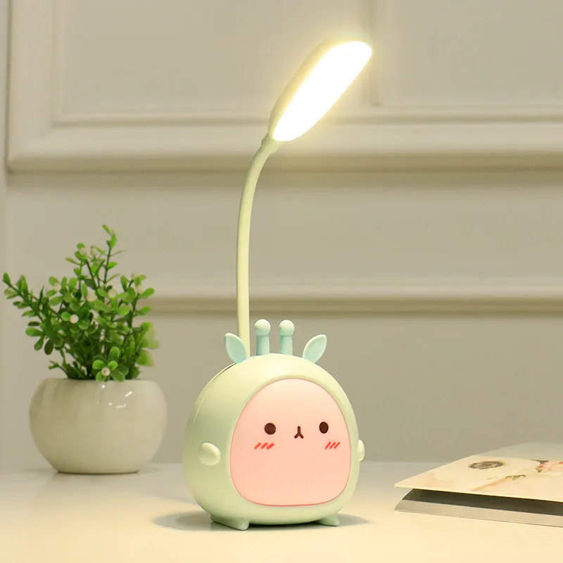 Cartoon deer USB charging folding LED reading lamp with plastic shade on desk