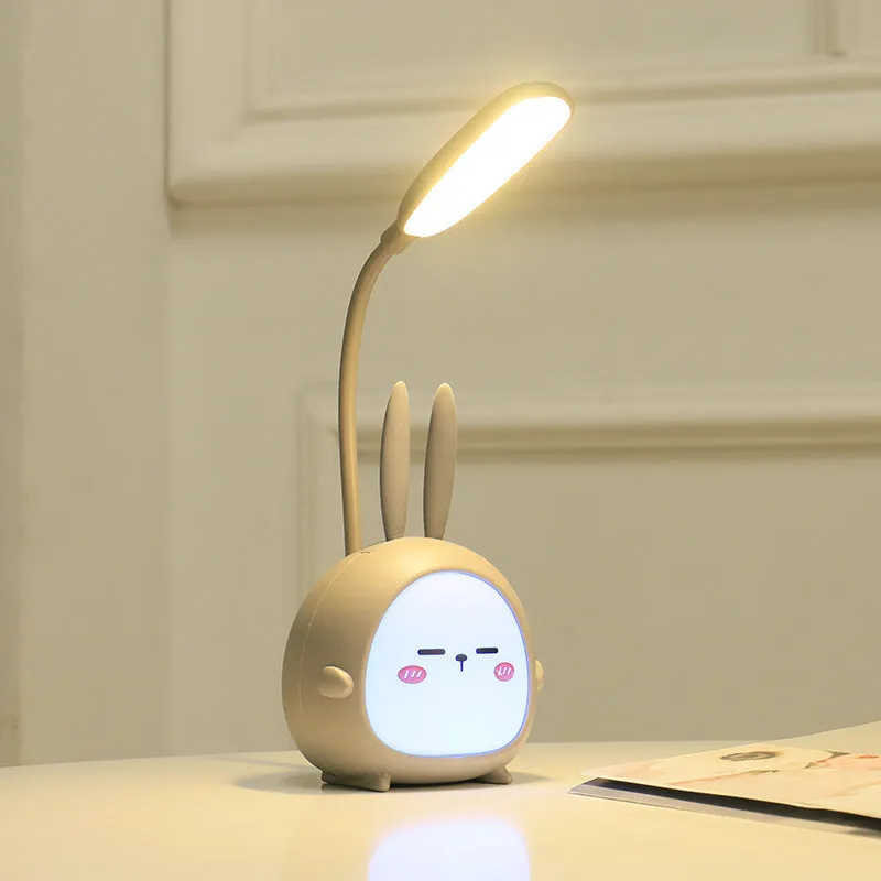 Cartoon deer USB charging folding LED reading lamp with plastic shade on desk