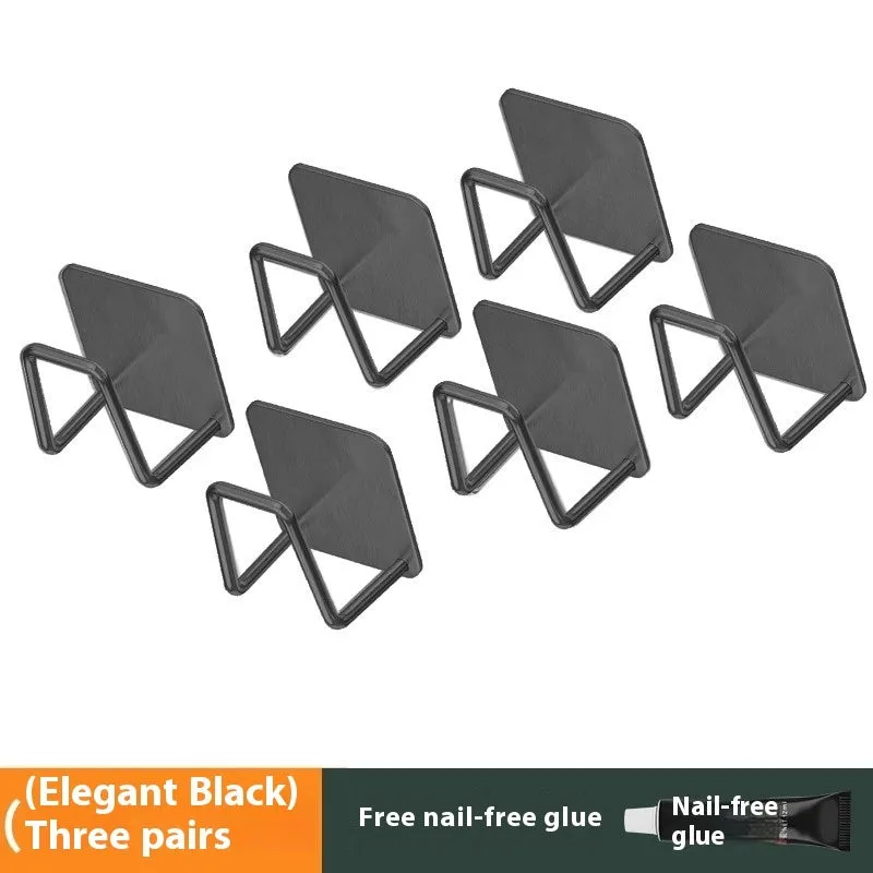 Stainless steel punch-free wall hanging pot storage rack in elegant black with adhesive backing
