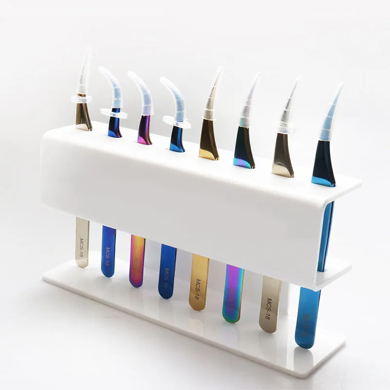 Acrylic tweezers display stand in white finish holding multiple tweezers upright