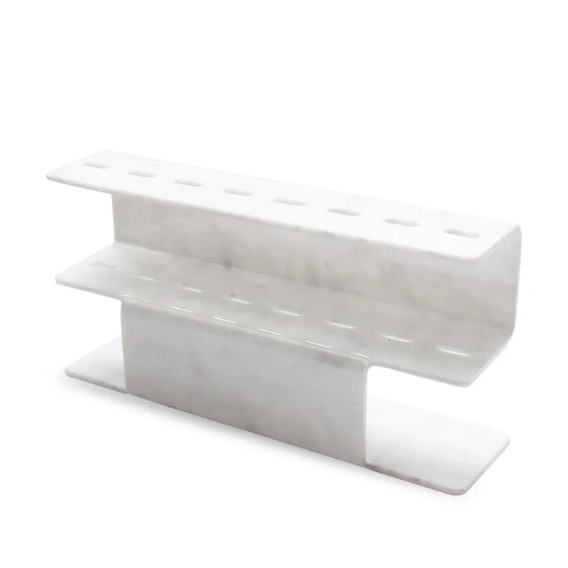 Acrylic tweezers display stand in white finish holding multiple tweezers upright