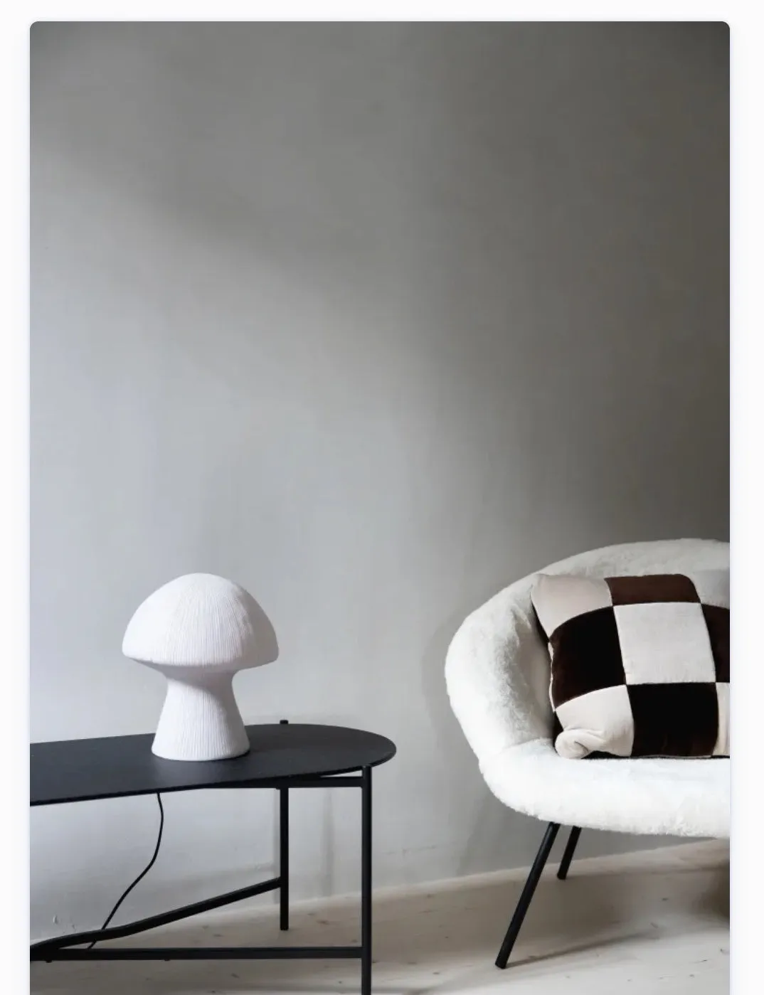 Nordic style handmade sandstone bedside table lamp with adjustable three-color light on a bedroom side table