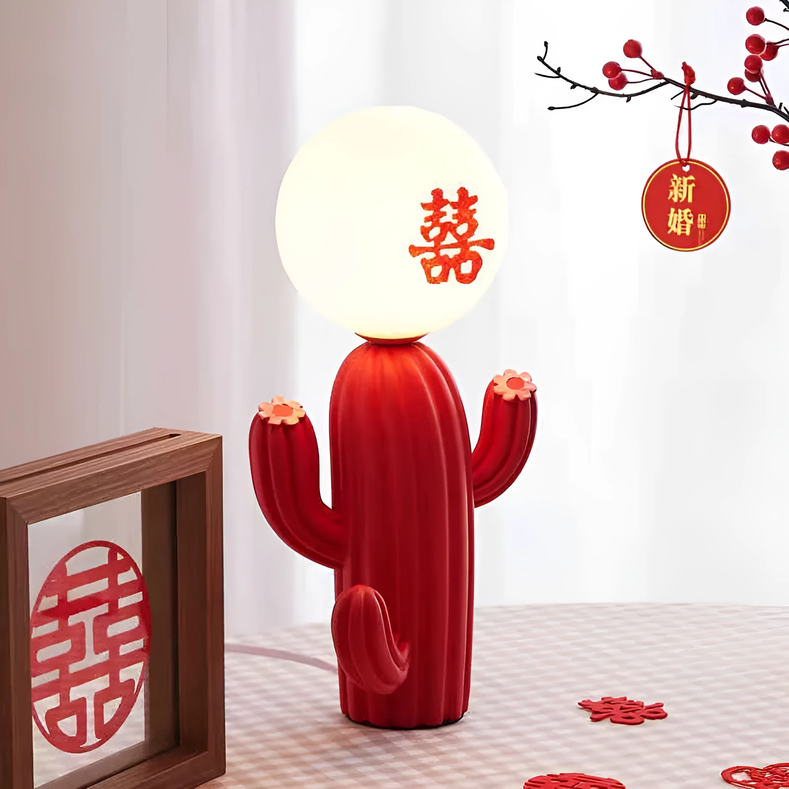 Green cactus button desk lamp with three-colour accents on a bedside table in a child's room