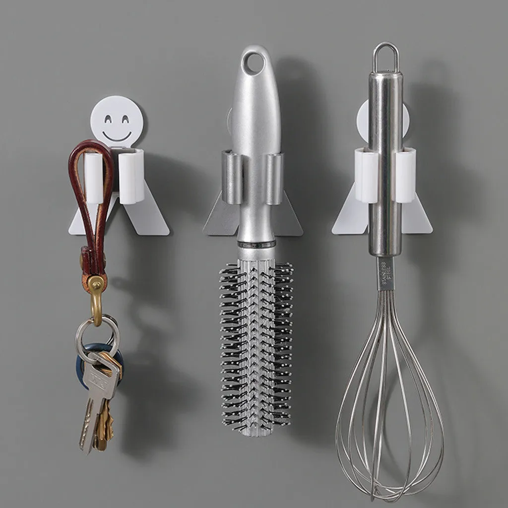 White bathroom toilet mop hook with adhesive backing for wall mounting, holding a toilet brush handle