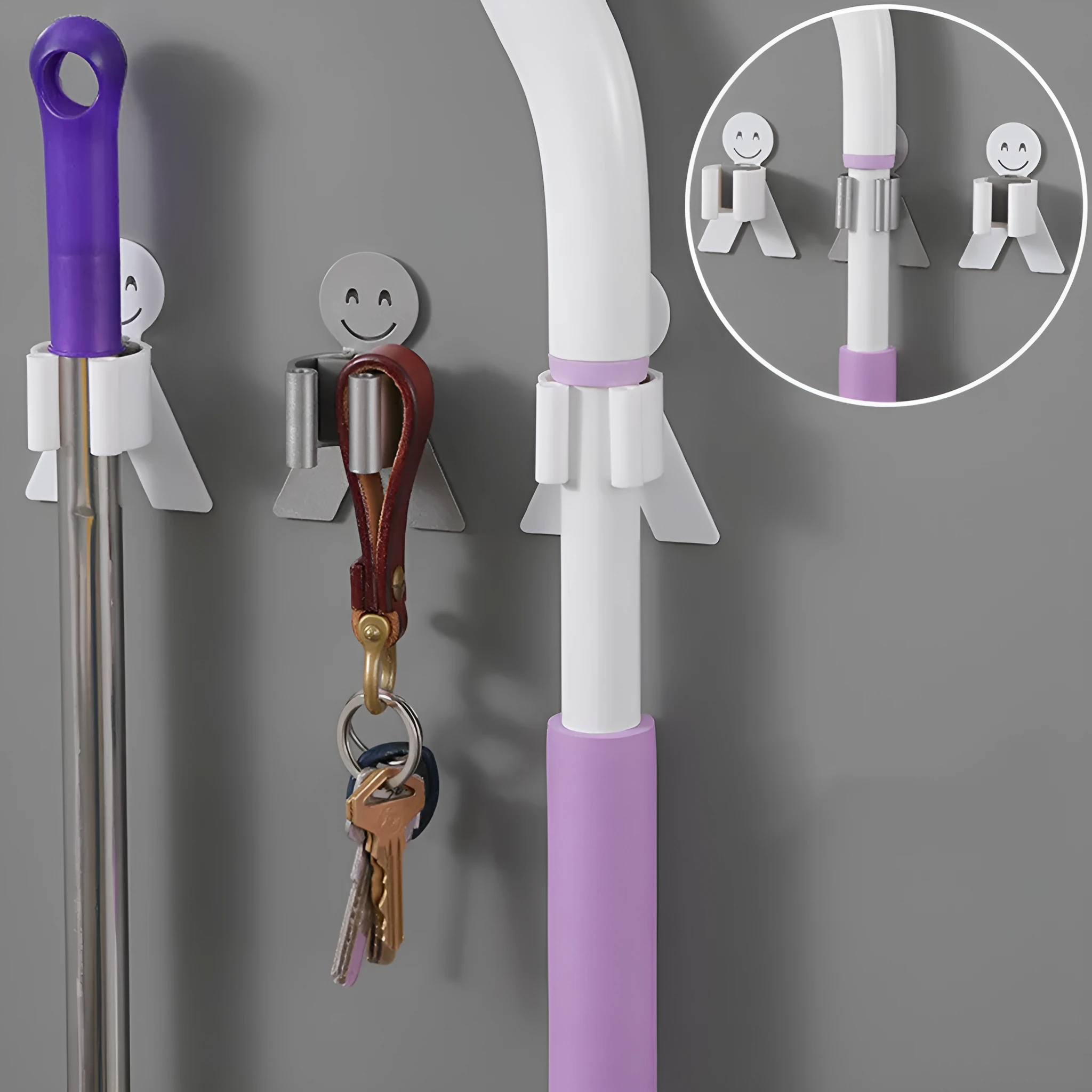 White bathroom toilet mop hook with adhesive backing for wall mounting, holding a toilet brush handle