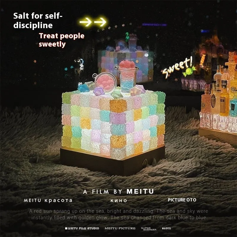 Crystal luminous cube sugar LED small night lamp with 8cm base on a table