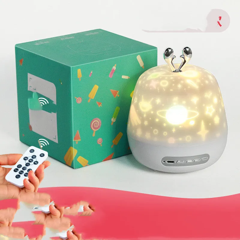 LED starry sky light projector with USB cable and projection film on a tabletop