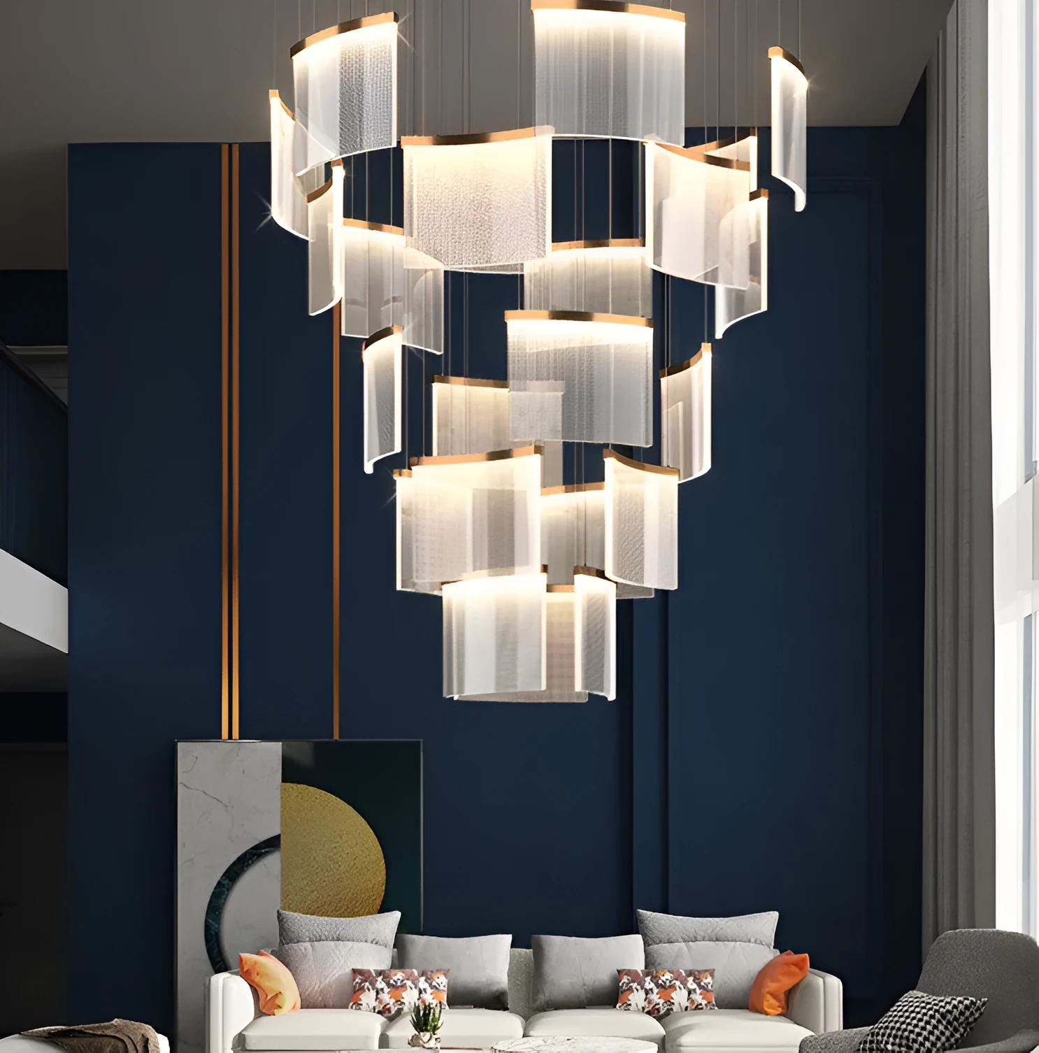 Large gold mesh disc chandelier with multiple pendant heads against a light ceiling